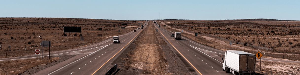 A highway surrounded by open land